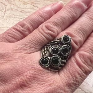 Grace and heart sterling and faceted onyx statement ring 
Size 8